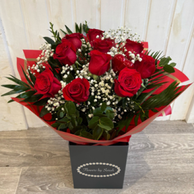 Luxury Dozen Red Roses - A classic dozen red roses- rich, velvety blooms symbolising deep love and romance. Elegant, timeless, and perfect for saying “I love you”. ?